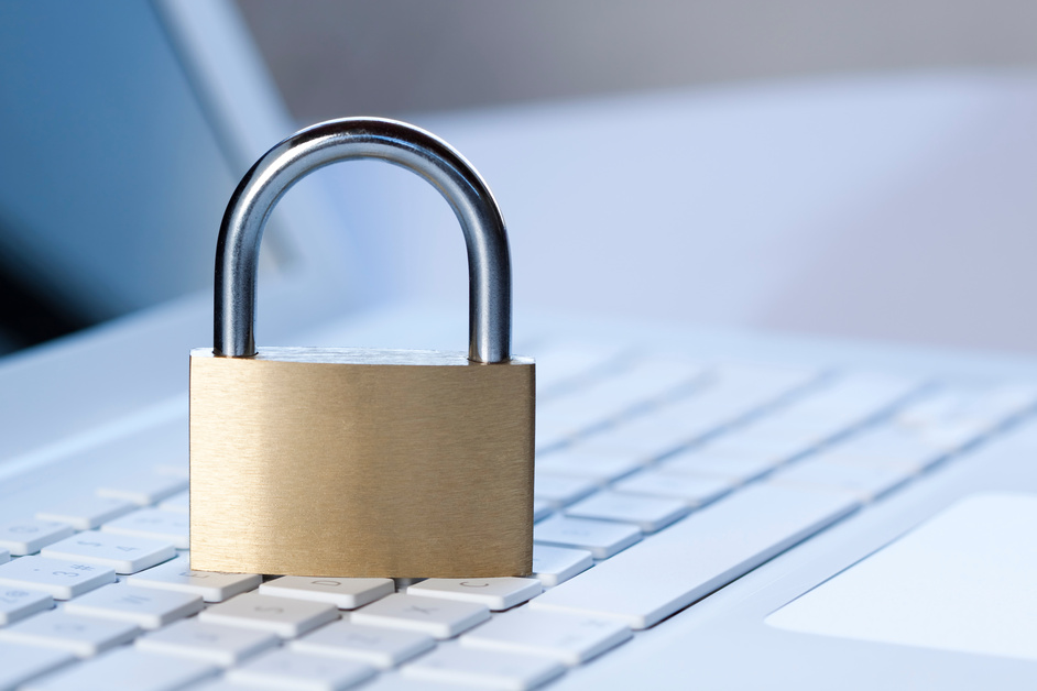 Padlock on computer keyboard